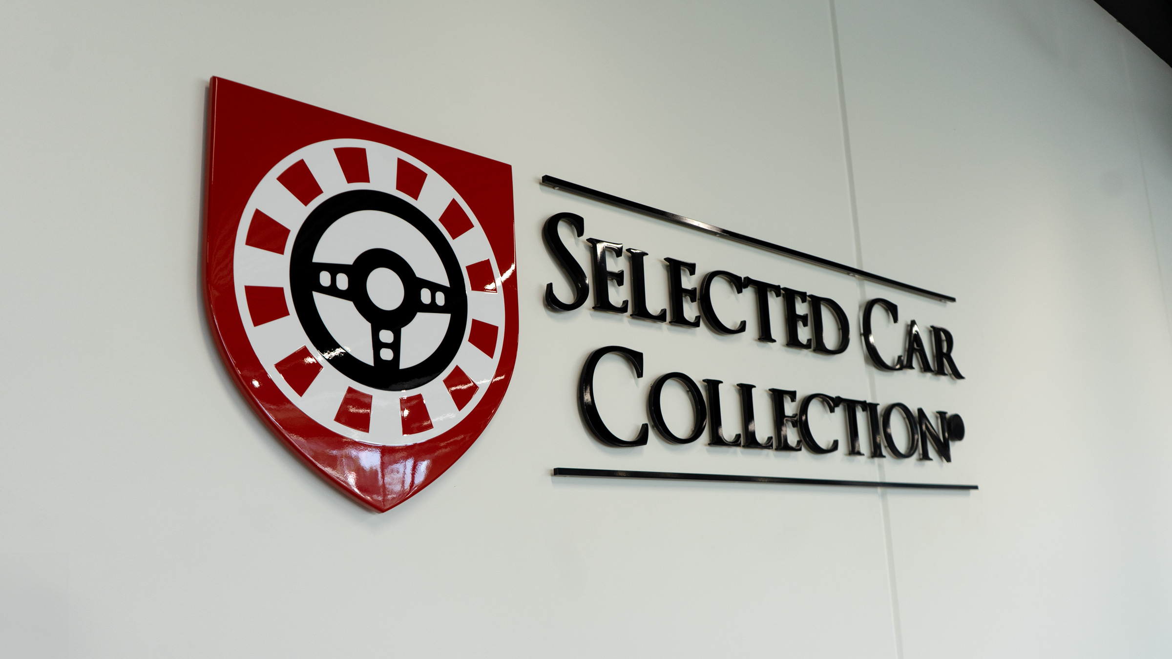 indvendige skilte logo og udskårede bogstaver Selected Car Collection
